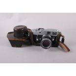 A Leica M4 Rangefinder camera, Chrome No 1189504, circa 1967, with a Summicorn 50mm fs No 1704249