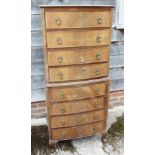 A mahogany bowfront tallboy of eight drawers, on cabriole supports, 24" wide x 17 1/2" deep x 57"