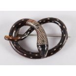 A 19th century tortoiseshell and pique inlaid serpent brooch