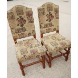 A set of eight oak framed dining chairs with padded seats and backs, on turned and stretchered