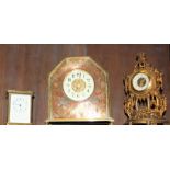 An early 20th century copper and brass cased mantel clock, decorated birds and ribbons with white