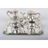 A Spanish white metal four-piece tea and coffee set, on tray, 1296g