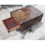 A William IV rosewood flap top work table, fitted two drawers, on inverse tapering square column and