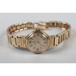 A lady's Omega 9ct gold wristwatch and bracelet, 18.2g gross