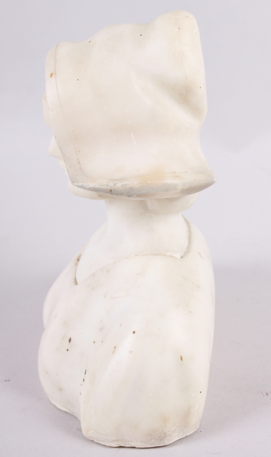 A white marble bust of a young woman, 6 1/2" high (restorations) - Bild 2 aus 5