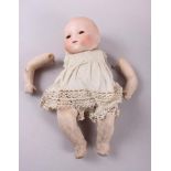 An Armand Marseille porcelain head doll, stamped 341/2K, Germany A'M (damages)