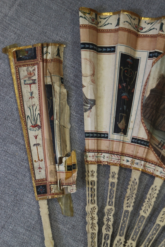 A collection of late 19th century and later Continental fans with pasted decoration (damages) - Bild 11 aus 17