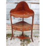 A mahogany bowfront corner washstand, fitted one drawer and undertier, on splay supports, 24" wide x