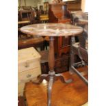 A 19th century mahogany circular top occasional table, on turned column and tripod splay support, 14