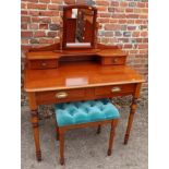 An "Exigence" cherrywood Art Deco design dressing table, fitted two drawers, on turned supports, 29"