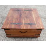 A sheesham square coffee table/coffer chest with hinged lid, on turned supports, 37" square x 17 1/