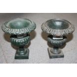Two matched cast metal campana urns on square bases, 6 1/4" high