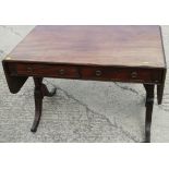 A late 19th century mahogany sofa table, fitted two drawers and drop leaves, on splay supports,