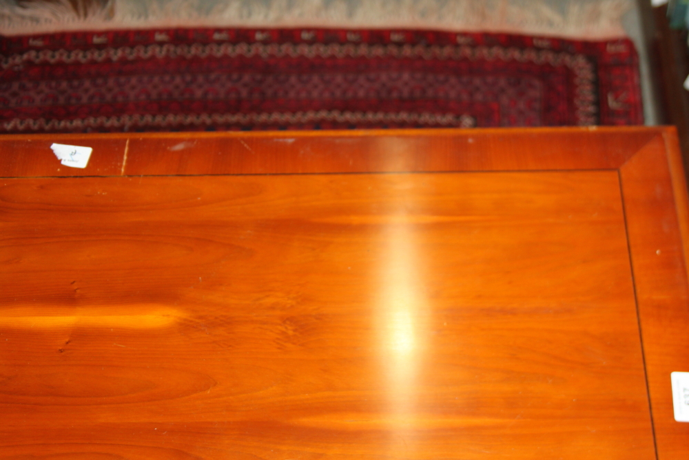 A yew wood and banded coffee table, 40" long, and a nest of three similar occasional tables, 23" - Image 6 of 8