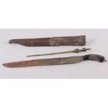 An 18th century white metal mounted pia ketta and a coconut stylus, 10 1/2" long