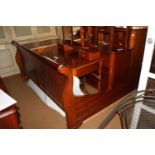 An "Exigence" cherrywood Art Deco design super king bateau lit