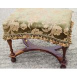 A polished as walnut stool of 17th century design with upholstered seat, stretcher and turned
