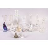 A pair of modernist glass candlesticks, a Wedgwood glass candlestick, a number of glass swans and