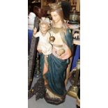 A Continental painted plaster figure of Madonna and child, 42" high