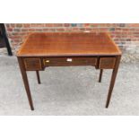 A mahogany and banded side table, fitted three doors, on square taper supports, 36" wide x 21"