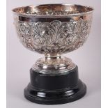 A silver rosebowl with embossed floral decoration, 17.5oz troy approx