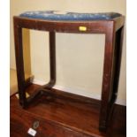 A 1930s polished as walnut dressing stool with needlework seat, on shaped supports