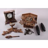 A French mahogany and brass mantel clock with white painted dial and Roman numerals, and a Schatz