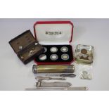 A Sampson Mordan silver mounted cigar cutter, a silver mounted toothbrush box, button hook, a
