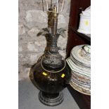 A smoky glass table lamp with metal acanthus leaf design, 24" high