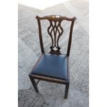 A mahogany side chair of Georgian design with drop-in seat, on chamfered supports