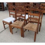 A set of six Belgian oak ladder back dining chairs with rush envelope seats, on square supports