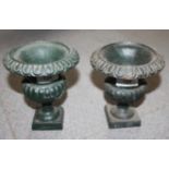 Two matched cast metal campana urns on square bases, 6 1/4" high