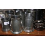 A collection of pewter tankards, various, two bottle coasters and a plated taste vin
