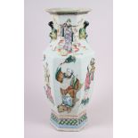 A Chinese porcelain hexagonal famille rose vase with immortal decoration, 16.5" high (chip to base)