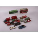 A collection of Tri-ang Minic tin-plate toys, including busses, fuel tankers, etc, and a number of