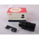 A Leica (Leitz Canada) Elmarit 135mm f2.8 lens with adaptor for camera body, in original box