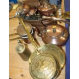 A 19th century copper kettle, a brass cream skimmer, a brass kettle stand and other metalwares