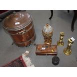 A copper two-handled container with matched cover, 16" high, two brass candlesticks, an oak desk