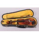 A 1970s 1/16 violin, by The Kiso Suzuki Violin company Ltd, with bow, in case