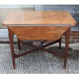 A Continental mahogany drop leaf occasional table with shaped top and 'X' frame stretcher, 37" wide