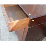 A 19th century mahogany side cupboard, fitted two drawers over two doors, on bracket feet, 47"