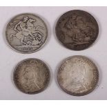 A Victorian silver crown, dated 1889, another dated 1900, a double-florin, dated 1888 and a half-