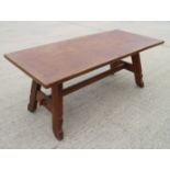 A Belgian oak refectory style dining table, on splay supports, 35" wide x 84" long x 30" high