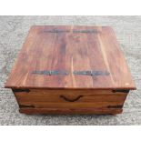 A sheesham square coffee table/coffer chest with hinged lid, on turned supports, 37" square x 17 1/