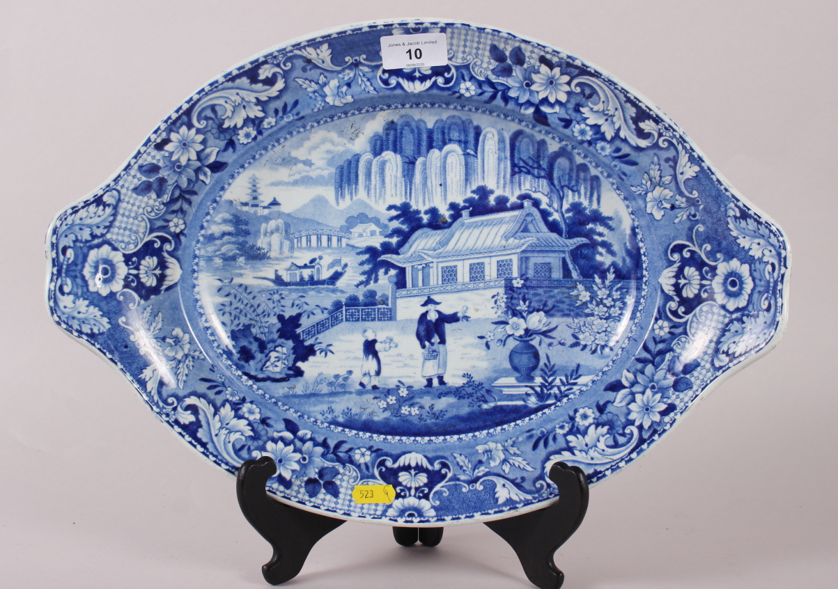 An early 19th century Davenport "Chinese Garden" pattern oval meat dish, 16" dia