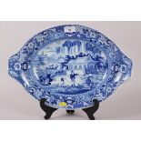 An early 19th century Davenport "Chinese Garden" pattern oval meat dish, 16" dia