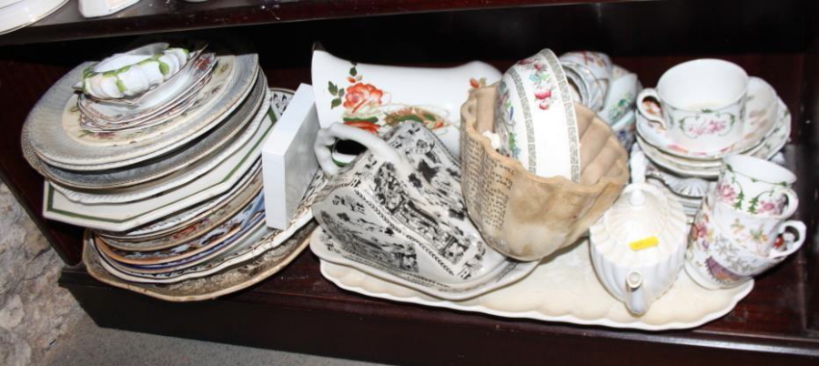 An assortment of china, including a cheese dish, a jelly mould, tazzas, plates, jugs, and a quantity