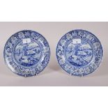 A pair of early 19th century blue and white transfer decorated dishes with figures and buildings, 9"