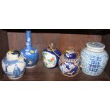 A Chinese blue and white ginger jar and cover, 7 1/2" high, two smaller ginger jars, a sprinkler
