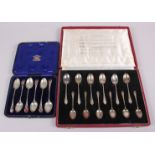 Twelve silver teaspoons, in fitted case, and a set of six silver teaspoons with hardstone inlay (